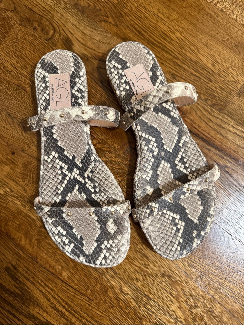 AGL Snake-Print Studded Slide Sandals in Beige and Black